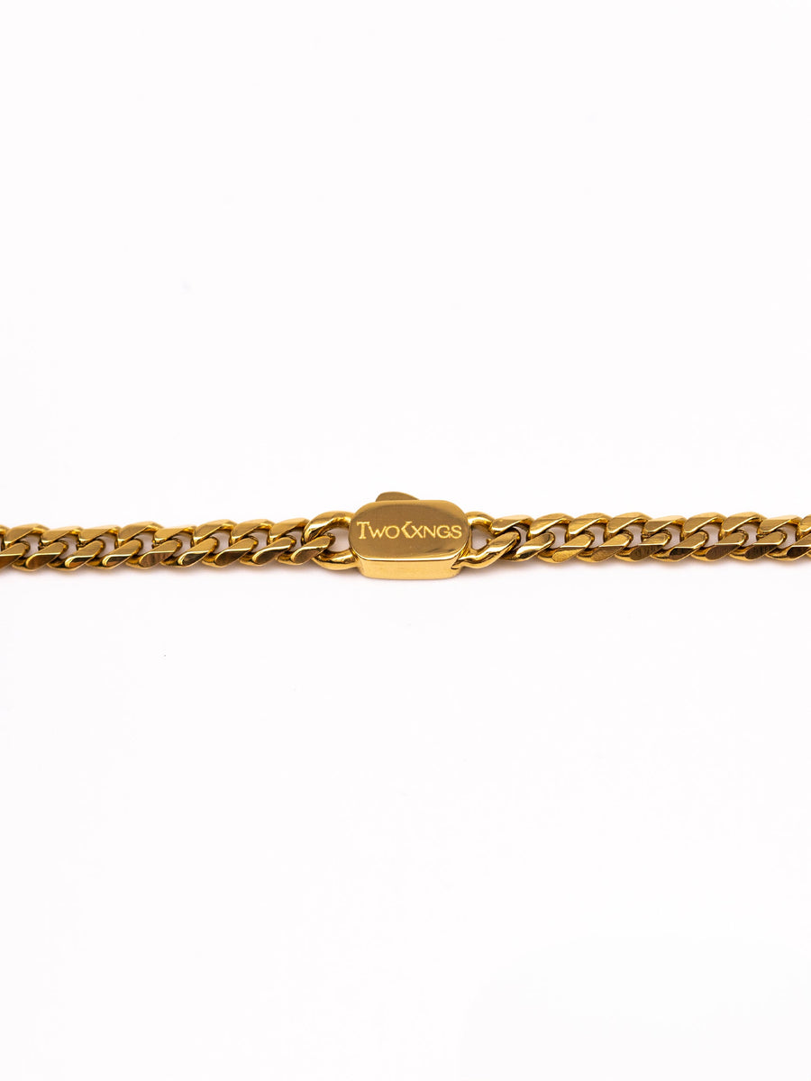 Close up of the Two Kxngs name engraved on the Basileus gold cuban chain